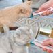Ложка для зручного годування котів смаколиками зі стіків у формі лапки